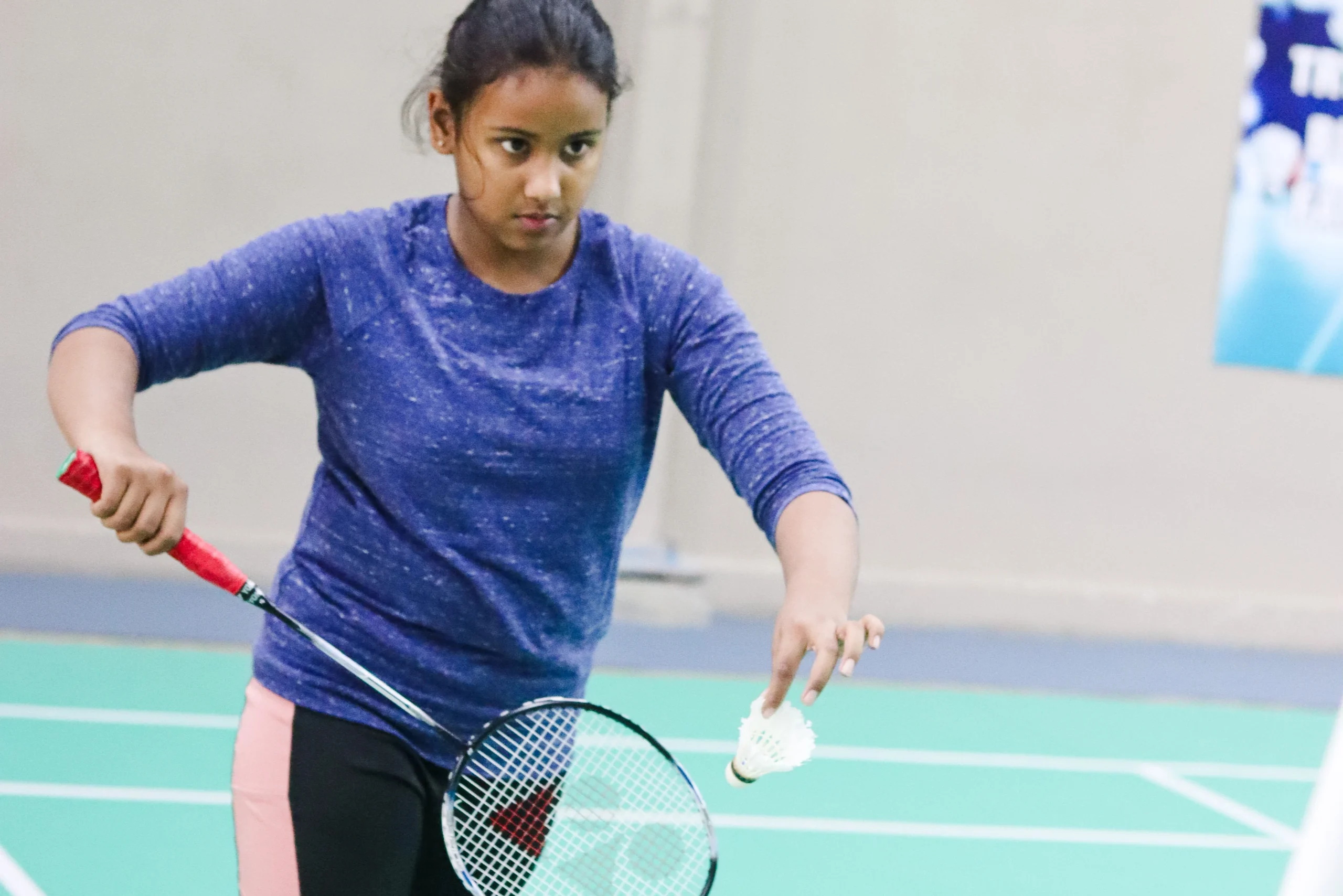 Badminton players exercise